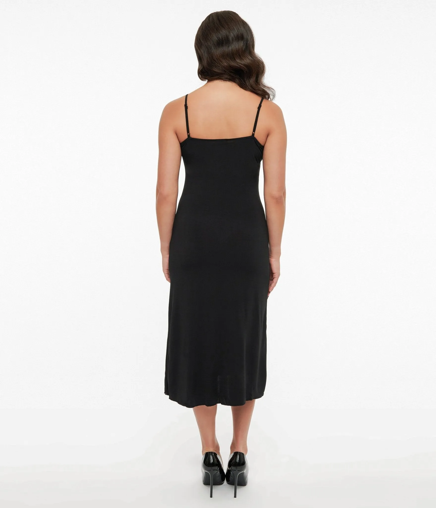 Unique Vintage Midi Length Black Stretch Slip